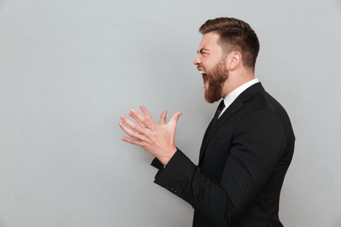 man-suit-shouting-gesturing-with-hands_8080776