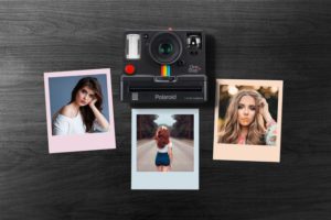 Free-Polaroid-Photos-on-Wall-Mockup-PSD