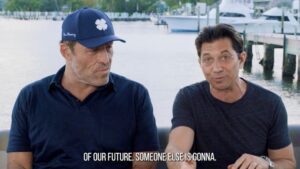 dean graziosi and tony robbins on a boat owing their future